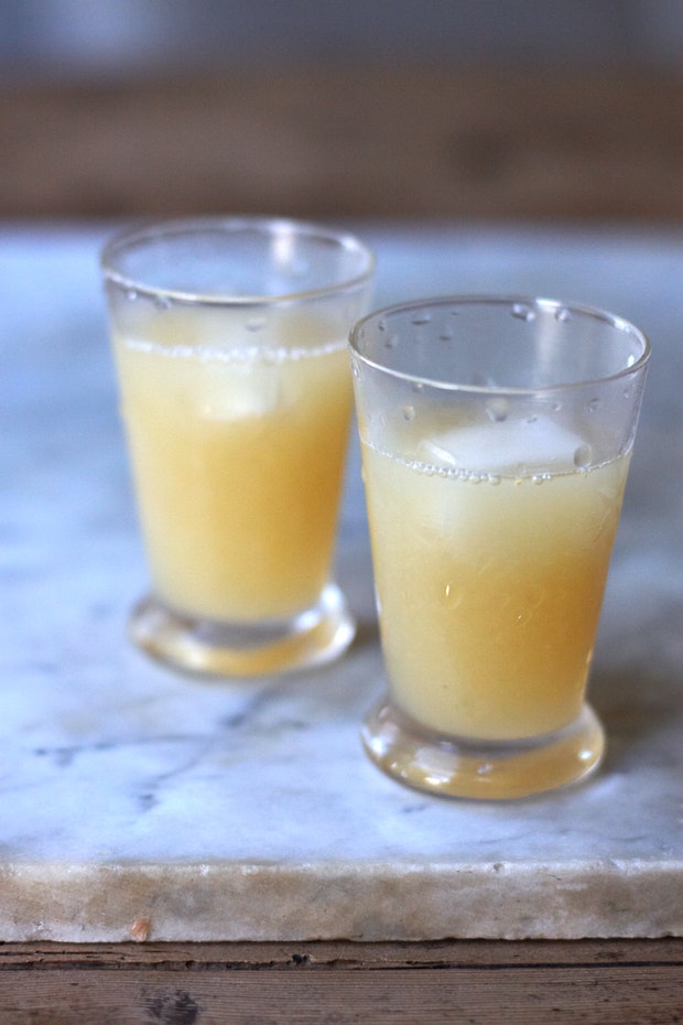 small glasses of freshly squeezed grapefruit juice