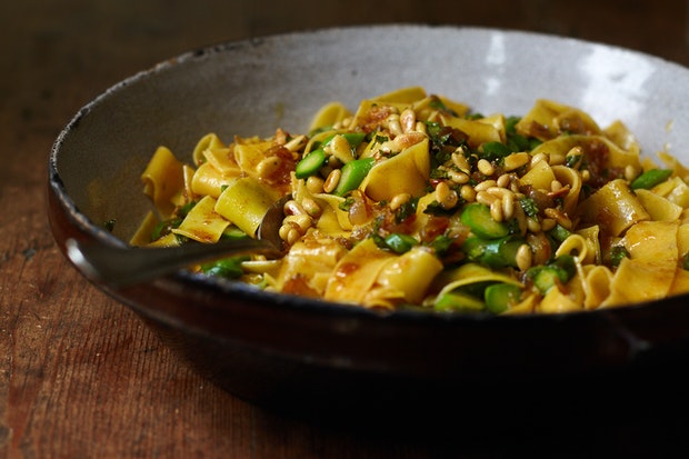 pappardelle with spiced butter in a serving bowl